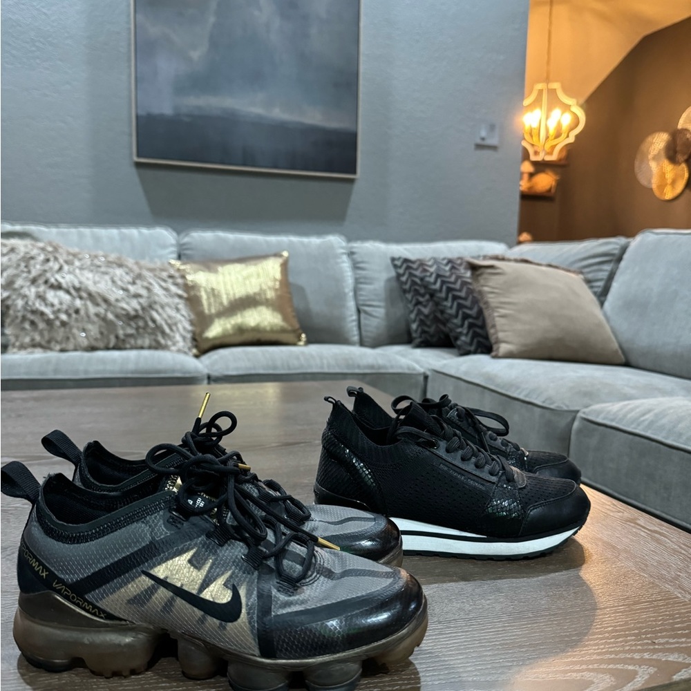 Nike size 4y fits woman size 5 (not wide)and michael kors size 5 shoes